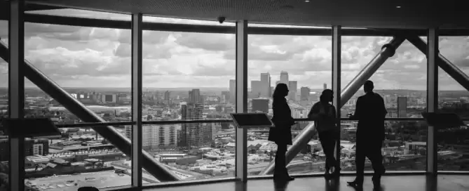 Business professionals discussing SaaS sales outsourcing strategy as part of a readiness assessment for software vendors considering an outsourced sales partner.
